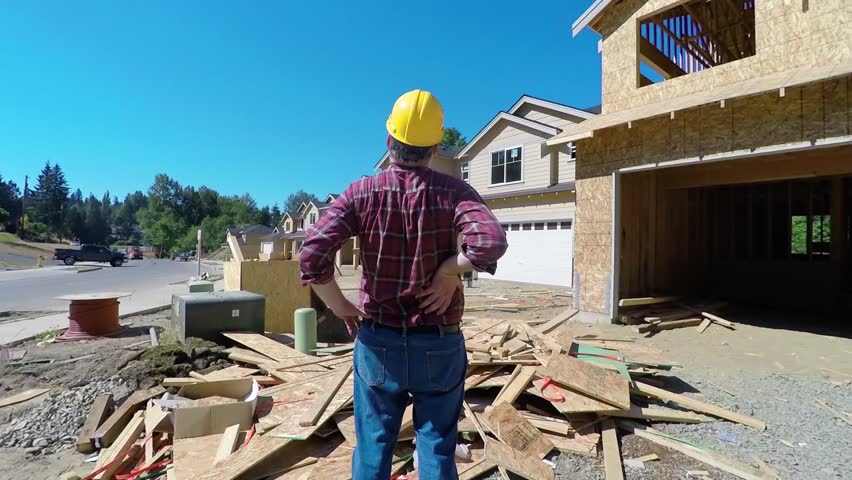 Construction cleanup crew preparing a site in South Gate, CA